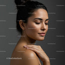Serene Woman with Elegant Hairstyle and Radiant Skin