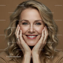 Smiling Woman with Curly Blonde Hair in Casual Attire