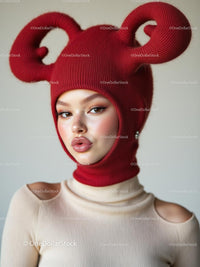Woman in Red Artistic Balaclava and Beige Top