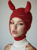 Stylish Woman in Red Hat and Trendy Winter Outfit