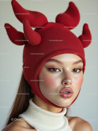 Fashionable Woman in Unique Red Horned Knit Hat