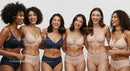 Diverse Women Smiling Together in Lingerie Fashion