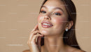 Smiling Woman with Radiant Skin and Elegant Earrings