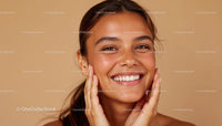 Joyful Woman with Natural Glow on Beige Background
