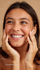 Joyful Woman Smiling with Hands on Face