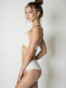 Elegant Woman in Stylish White Underwear