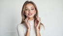 Elegant Woman in White Turtleneck Smiling Confidently