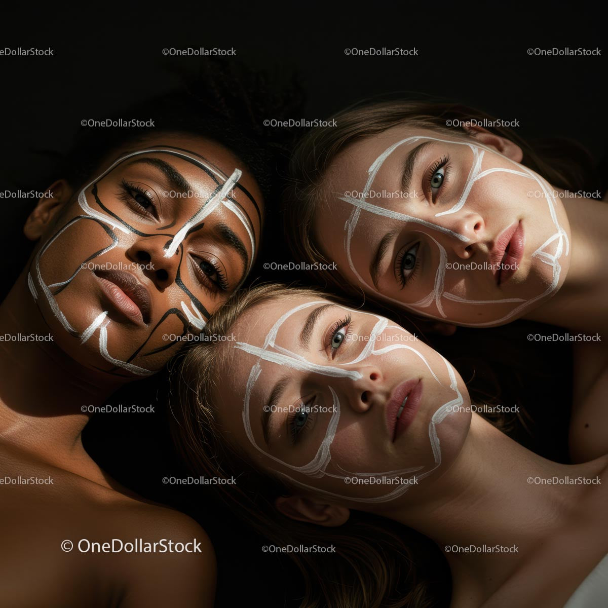 Women with Artistic Face Paint in Peaceful Harmony
