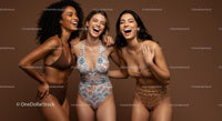 Three Women Laughing in Stylish Swimwear