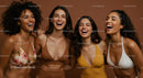 Diverse Group of Women Laughing in Vibrant Swimwear