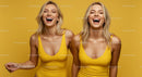 Two Smiling Women in Vibrant Yellow Dresses