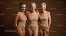 Three Joyful Senior Women Embracing Friendship