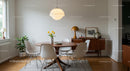 Scandinavian Dining Room with Yellow Tulips and Modern Decor