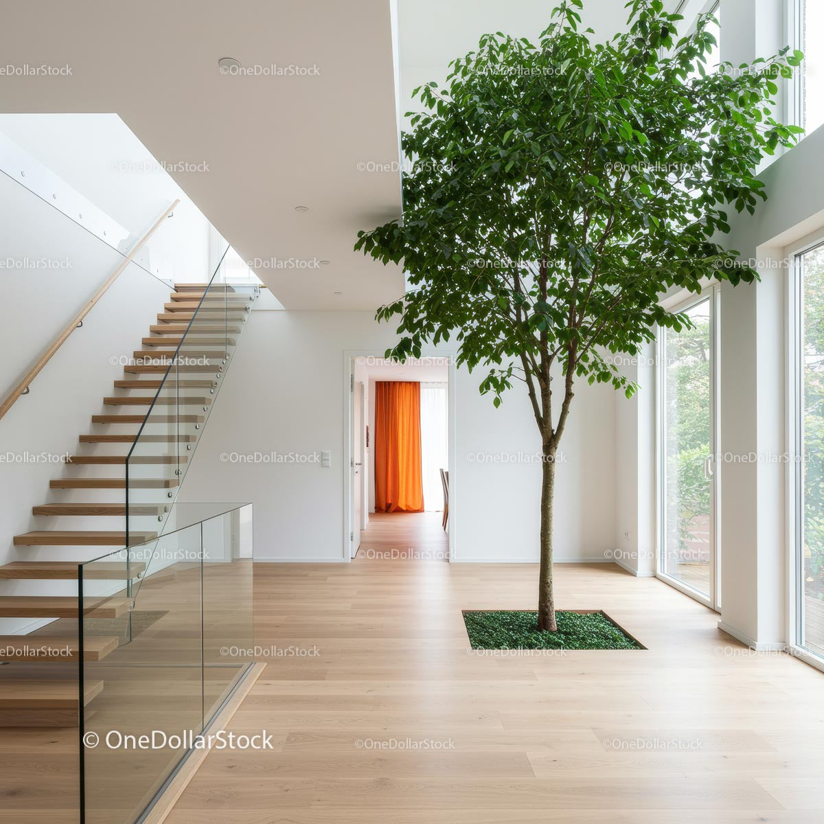 Contemporary Interior with Indoor Tree and Glass Staircase