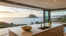 Modern Kitchen Overlooking Serene Coastal Sunset