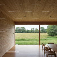 Minimalist Wooden Interior Overlooking Lush Green Field