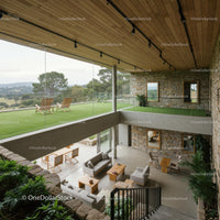 Modern Home with Glass Walls Overlooking Scenic Landscape