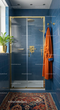 Luxury Blue Tiled Bathroom with Orange Bathrobe