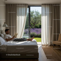 Man Relaxing in Bedroom with Lavender Garden View