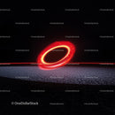 Glowing Red Neon Circle on Textured Surface at Night