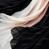 Elegant Black and White Silk Fabric with Flowing Drapery