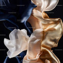 Elegant Silk Fabrics in Gold and Blue Contrast