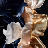 Elegant Silk Fabrics in Gold and Blue Contrast