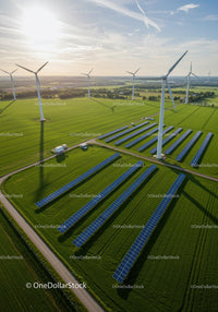 Aerial View of Wind Turbines and Solar Panels in Green Landscape