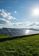 Solar Panels on Green Field Under Bright Sunlight