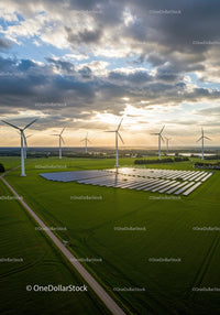 Wind Turbines and Solar Panels in Lush Green Countryside