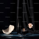 Elegant Black Vase and Ceramic Bowl with Delicate Flower