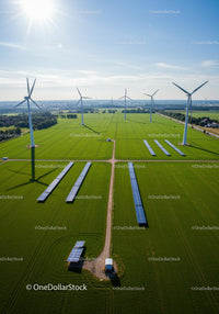 Wind Turbines and Solar Panels in Green Field