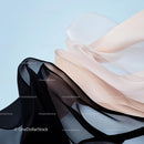 Elegant Flowing Fabric in Black and Beige Waves