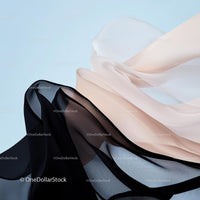 Elegant Flowing Fabric in Black and Beige Waves