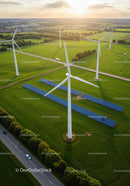 Aerial View of Wind Turbines and Solar Panels in Green Fields