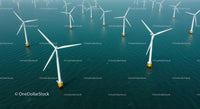 Aerial View of Offshore Wind Turbines in Blue Ocean