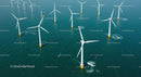 Aerial View of Offshore Wind Turbines in Blue Ocean