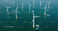Aerial View of Offshore Wind Turbines in Blue Ocean