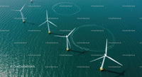 Aerial View of Offshore Wind Turbines in Blue Ocean Waters