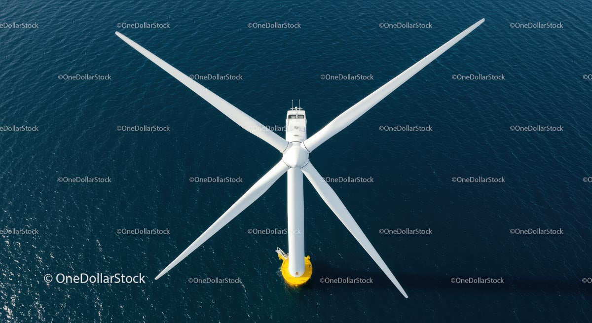 Aerial View of Offshore Wind Turbine in the Blue Ocean