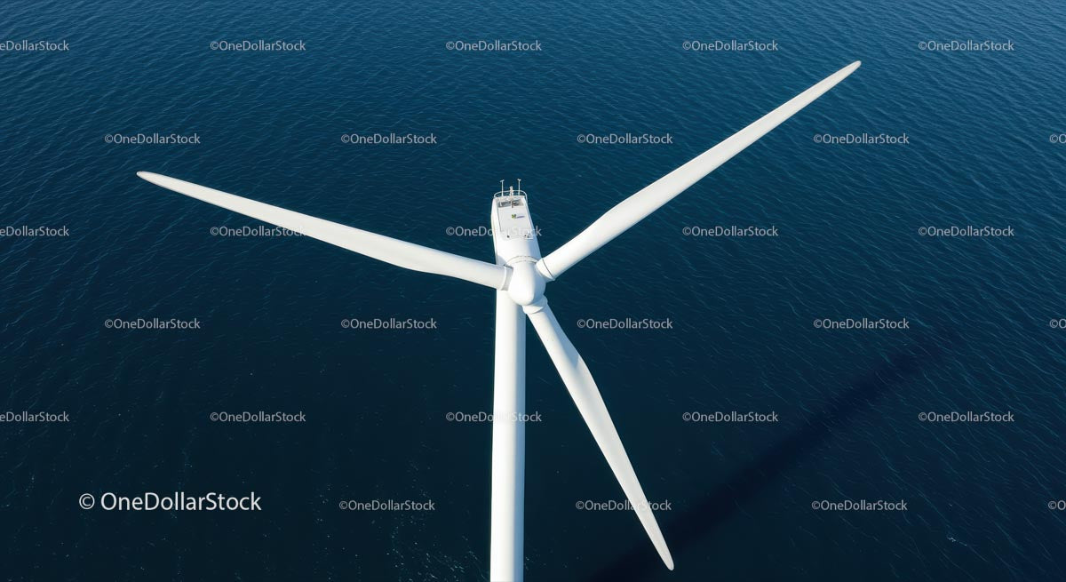 Aerial View of Offshore Wind Turbine over Ocean