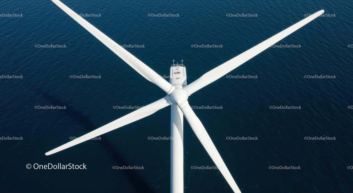 Aerial View of Offshore Wind Turbine Over Open Sea