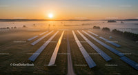 Misty Sunrise Over Solar Panel Array