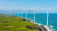 Wind Turbines on a Coastal Green Landscape