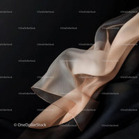Elegant Beige Fabric Flowing on Black Background