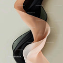 Elegant Beige and Black Abstract Ribbon Design