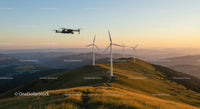 Drone Over Wind Turbines at Sunset in Rolling Hills