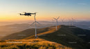 Drone Flying Over Wind Turbines at Sunset in Mountain Landscape