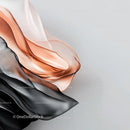 Elegant Silk Fabric in Black, White, and Copper Waves