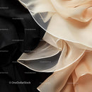 Elegant Black and Beige Flowing Fabric Texture